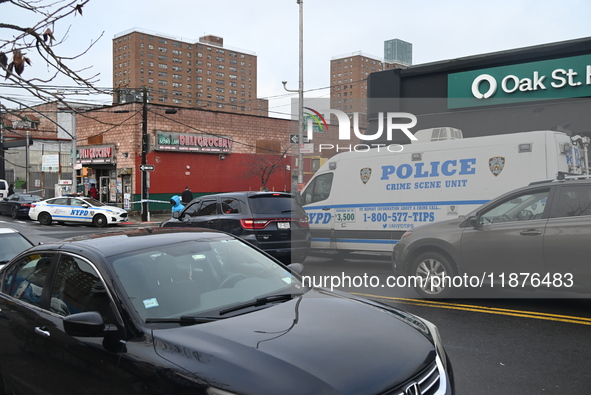 A man is stabbed multiple times to death outside of Mucho Luco Deli Grocery in Brownsville, Brooklyn, New York, United States, on December 1...