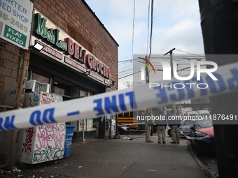 A man is stabbed multiple times to death outside of Mucho Luco Deli Grocery in Brownsville, Brooklyn, New York, United States, on December 1...