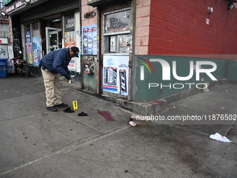 New York City Police Department crime scene investigators are at the scene of a 34-year-old man being stabbed multiple times to death at Muc...