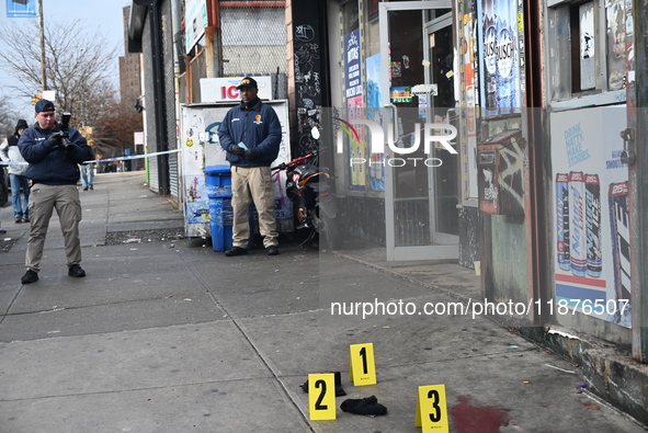 New York City Police Department crime scene investigators are at the scene of a 34-year-old man being stabbed multiple times to death at Muc...