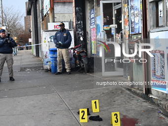 New York City Police Department crime scene investigators are at the scene of a 34-year-old man being stabbed multiple times to death at Muc...