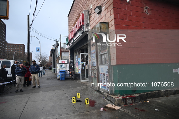 New York City Police Department crime scene investigators are at the scene of a 34-year-old man being stabbed multiple times to death at Muc...