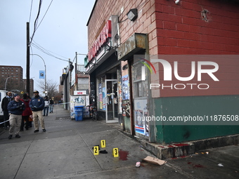 New York City Police Department crime scene investigators are at the scene of a 34-year-old man being stabbed multiple times to death at Muc...