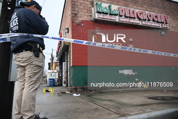 New York City Police Department crime scene investigators are at the scene of a 34-year-old man being stabbed multiple times to death at Muc...