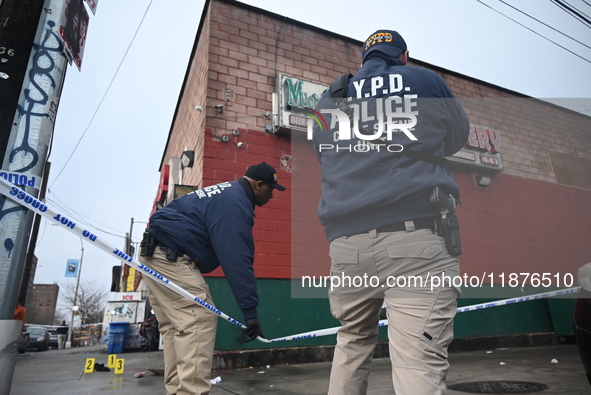 New York City Police Department crime scene investigators are at the scene of a 34-year-old man being stabbed multiple times to death at Muc...