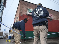 New York City Police Department crime scene investigators are at the scene of a 34-year-old man being stabbed multiple times to death at Muc...