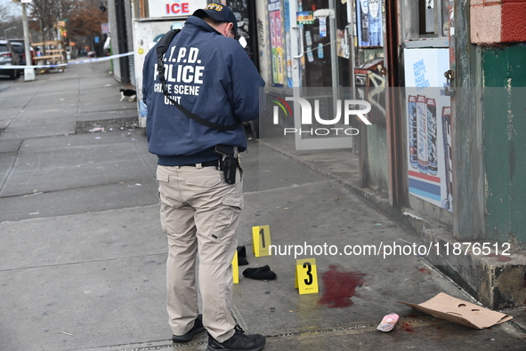 New York City Police Department crime scene investigators are at the scene of a 34-year-old man being stabbed multiple times to death at Muc...