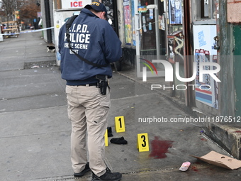 New York City Police Department crime scene investigators are at the scene of a 34-year-old man being stabbed multiple times to death at Muc...