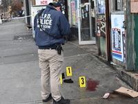 New York City Police Department crime scene investigators are at the scene of a 34-year-old man being stabbed multiple times to death at Muc...