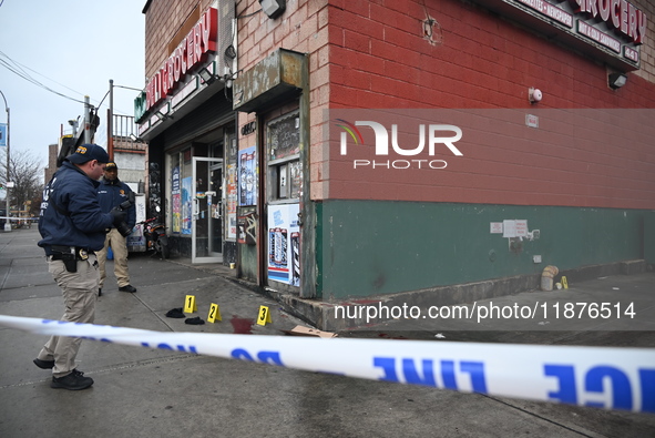 New York City Police Department crime scene investigators are at the scene of a 34-year-old man being stabbed multiple times to death at Muc...