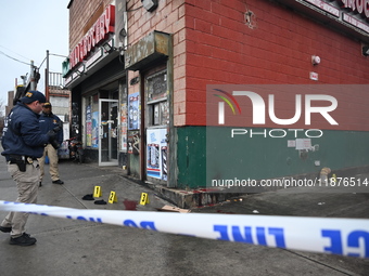 New York City Police Department crime scene investigators are at the scene of a 34-year-old man being stabbed multiple times to death at Muc...