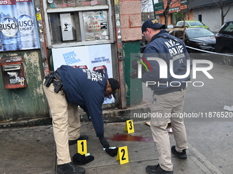 New York City Police Department crime scene investigators are at the scene of a 34-year-old man being stabbed multiple times to death at Muc...