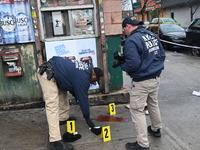 New York City Police Department crime scene investigators are at the scene of a 34-year-old man being stabbed multiple times to death at Muc...