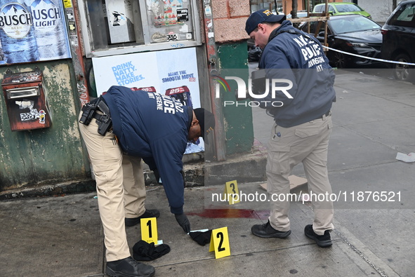 New York City Police Department crime scene investigators are at the scene of a 34-year-old man being stabbed multiple times to death at Muc...