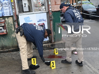 New York City Police Department crime scene investigators are at the scene of a 34-year-old man being stabbed multiple times to death at Muc...