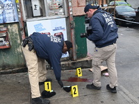 New York City Police Department crime scene investigators are at the scene of a 34-year-old man being stabbed multiple times to death at Muc...