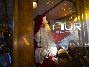 A Christmas retro tram with Santa Claus and Snow White is in Sofia, Bulgaria, on December 17, 2024. The retro tram, which is 115 years old,...