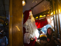 A Christmas retro tram with Santa Claus and Snow White is in Sofia, Bulgaria, on December 17, 2024. The retro tram, which is 115 years old,...