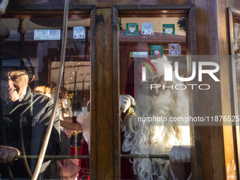 A Christmas retro tram with Santa Claus and Snow White is in Sofia, Bulgaria, on December 17, 2024. The retro tram, which is 115 years old,...