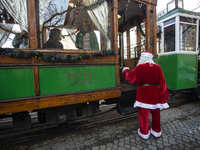 A Christmas retro tram with Santa Claus and Snow White is in Sofia, Bulgaria, on December 17, 2024. The retro tram, which is 115 years old,...