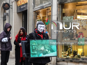 The group 'Anonymous for the Voiceless', an animal rights organization specializing in street activism, holds a 'Cubes of Truth' protest act...