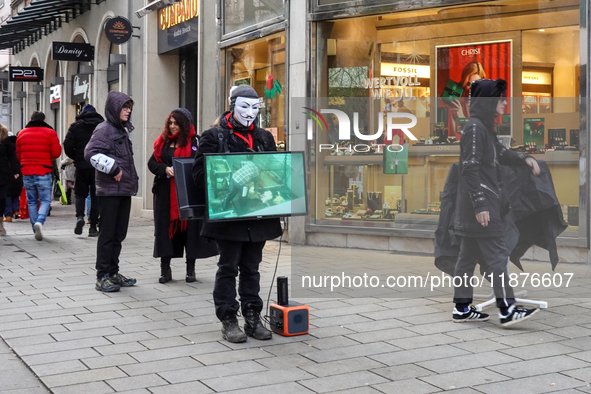 The group 'Anonymous for the Voiceless', an animal rights organization specializing in street activism, holds a 'Cubes of Truth' protest act...