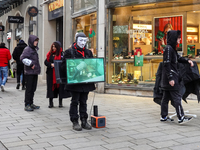 The group 'Anonymous for the Voiceless', an animal rights organization specializing in street activism, holds a 'Cubes of Truth' protest act...