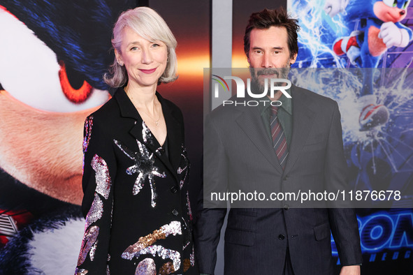 Alexandra Grant and boyfriend Keanu Reeves arrive at the Los Angeles Premiere Of Paramount Pictures' 'Sonic The Hedgehog 3' held at the TCL...