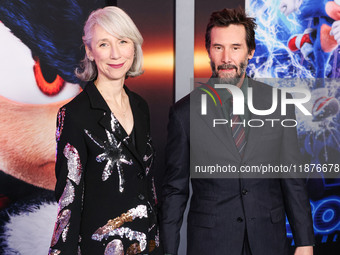 Alexandra Grant and boyfriend Keanu Reeves arrive at the Los Angeles Premiere Of Paramount Pictures' 'Sonic The Hedgehog 3' held at the TCL...