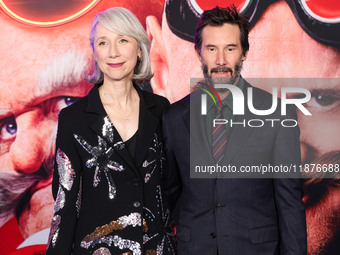 Alexandra Grant and boyfriend Keanu Reeves arrive at the Los Angeles Premiere Of Paramount Pictures' 'Sonic The Hedgehog 3' held at the TCL...