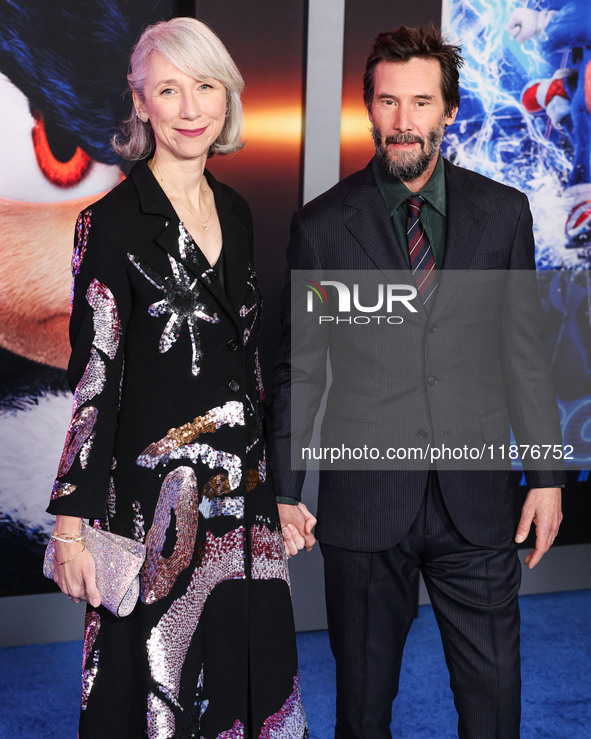 Alexandra Grant and boyfriend Keanu Reeves arrive at the Los Angeles Premiere Of Paramount Pictures' 'Sonic The Hedgehog 3' held at the TCL...