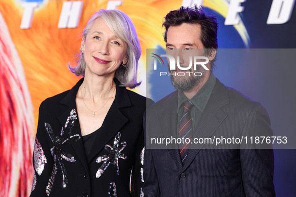 Alexandra Grant and boyfriend Keanu Reeves arrive at the Los Angeles Premiere Of Paramount Pictures' 'Sonic The Hedgehog 3' held at the TCL...