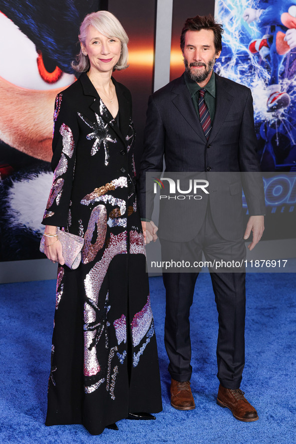 Alexandra Grant and boyfriend Keanu Reeves arrive at the Los Angeles Premiere Of Paramount Pictures' 'Sonic The Hedgehog 3' held at the TCL...