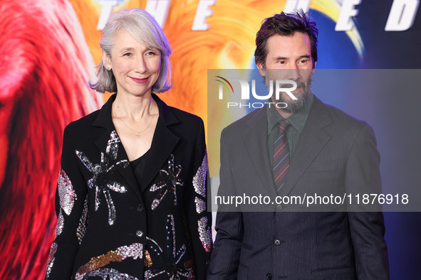 Alexandra Grant and boyfriend Keanu Reeves arrive at the Los Angeles Premiere Of Paramount Pictures' 'Sonic The Hedgehog 3' held at the TCL...