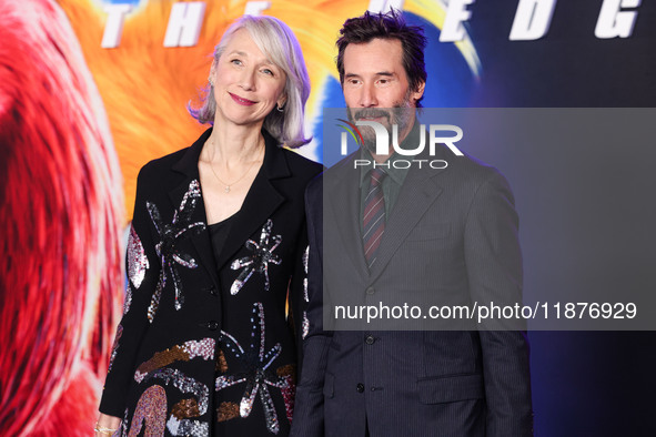 Alexandra Grant and boyfriend Keanu Reeves arrive at the Los Angeles Premiere Of Paramount Pictures' 'Sonic The Hedgehog 3' held at the TCL...