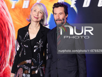 Alexandra Grant and boyfriend Keanu Reeves arrive at the Los Angeles Premiere Of Paramount Pictures' 'Sonic The Hedgehog 3' held at the TCL...