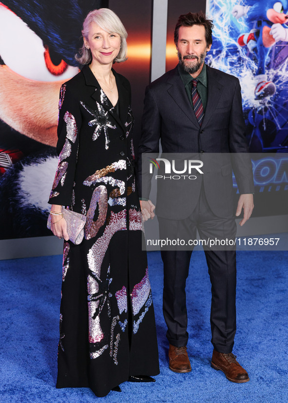 Alexandra Grant and boyfriend Keanu Reeves arrive at the Los Angeles Premiere Of Paramount Pictures' 'Sonic The Hedgehog 3' held at the TCL...