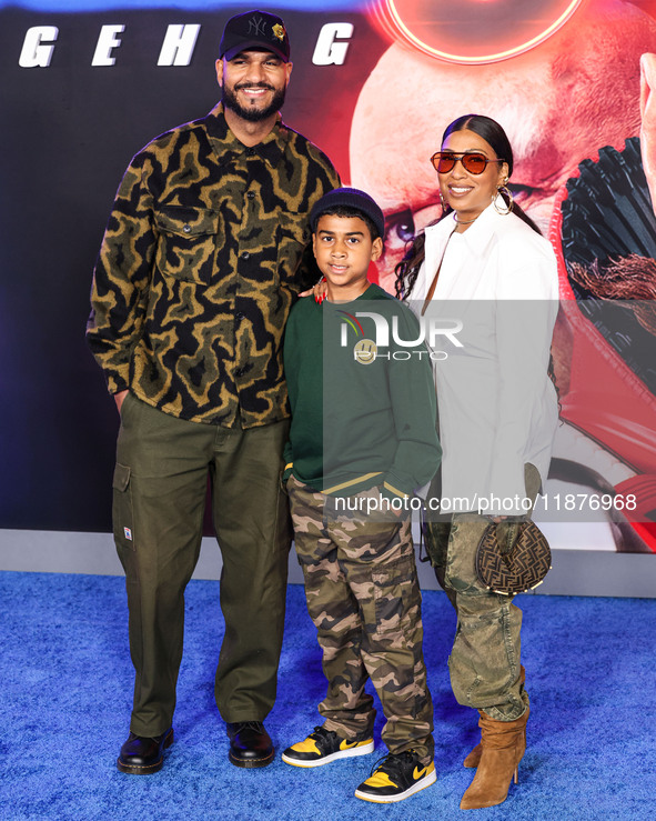 Jared Cotter and Melanie Fiona arrive at the Los Angeles Premiere Of Paramount Pictures' 'Sonic The Hedgehog 3' held at the TCL Chinese Thea...