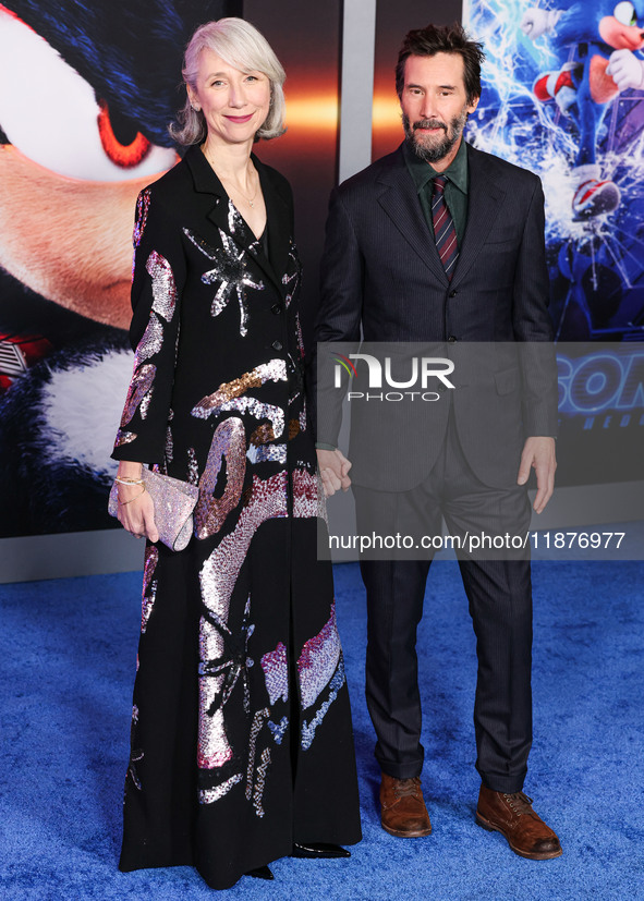 Alexandra Grant and boyfriend Keanu Reeves arrive at the Los Angeles Premiere Of Paramount Pictures' 'Sonic The Hedgehog 3' held at the TCL...