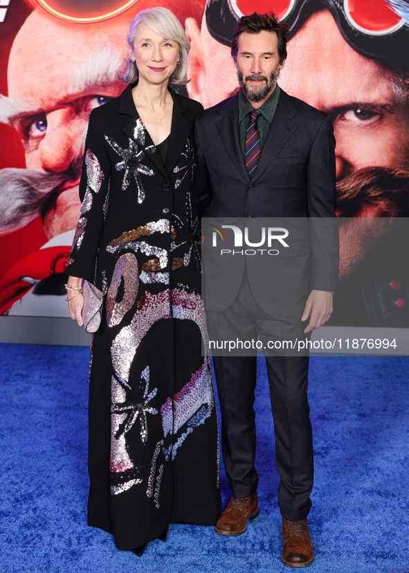 Alexandra Grant and boyfriend Keanu Reeves arrive at the Los Angeles Premiere Of Paramount Pictures' 'Sonic The Hedgehog 3' held at the TCL...