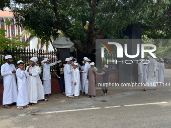 Muslim students stand outside the Kerala Legislative Assembly building in Thiruvananthapuram, Kerala, India, on April 15, 2024. The Kerala L...