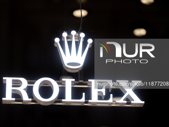 The Rolex logo is in a store window, seen on the street in Warsaw, Poland, on December 12, 2024. (