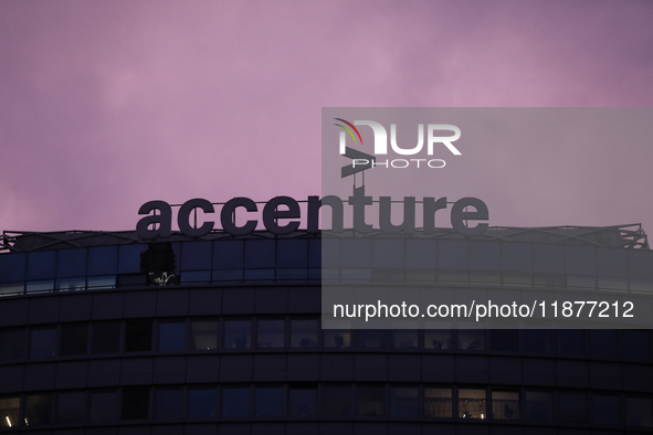 The Accenture logo is seen on the street in Warsaw, Poland, on December 12, 2024. 