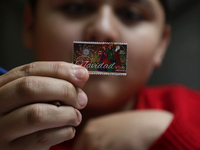 Girls and boys visit the Mexican Postal Service facilities at the Postal Palace in the Zocalo of Mexico City, Mexico, on December 17, 2024,...