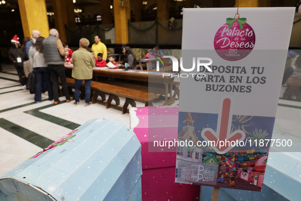 Girls and boys visit the Mexican Postal Service facilities at the Postal Palace in the Zocalo of Mexico City, Mexico, on December 17, 2024,...