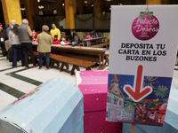 Girls and boys visit the Mexican Postal Service facilities at the Postal Palace in the Zocalo of Mexico City, Mexico, on December 17, 2024,...