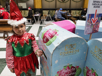 Girls and boys visit the Mexican Postal Service facilities at the Postal Palace in the Zocalo of Mexico City, Mexico, on December 17, 2024,...