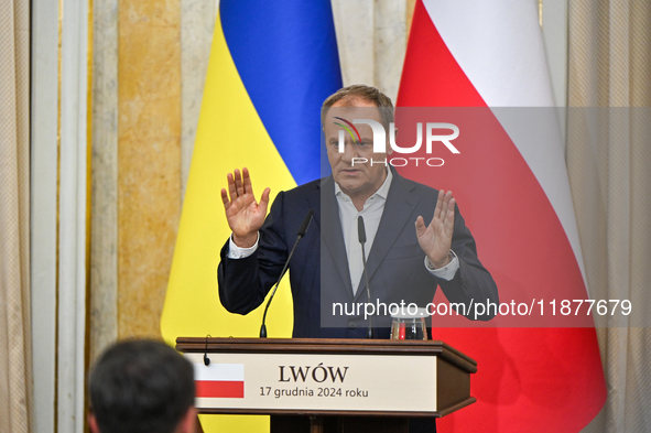 In Lviv, Ukraine, on December 17, 2024, Polish Prime Minister Donald Tusk speaks during a joint press conference with President of Ukraine V...