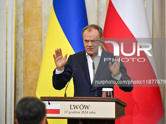 In Lviv, Ukraine, on December 17, 2024, Polish Prime Minister Donald Tusk speaks during a joint press conference with President of Ukraine V...