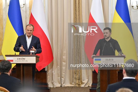 President of Ukraine Volodymyr Zelenskyy and Polish Prime Minister Donald Tusk are pictured during a joint press conference at the Potocki P...